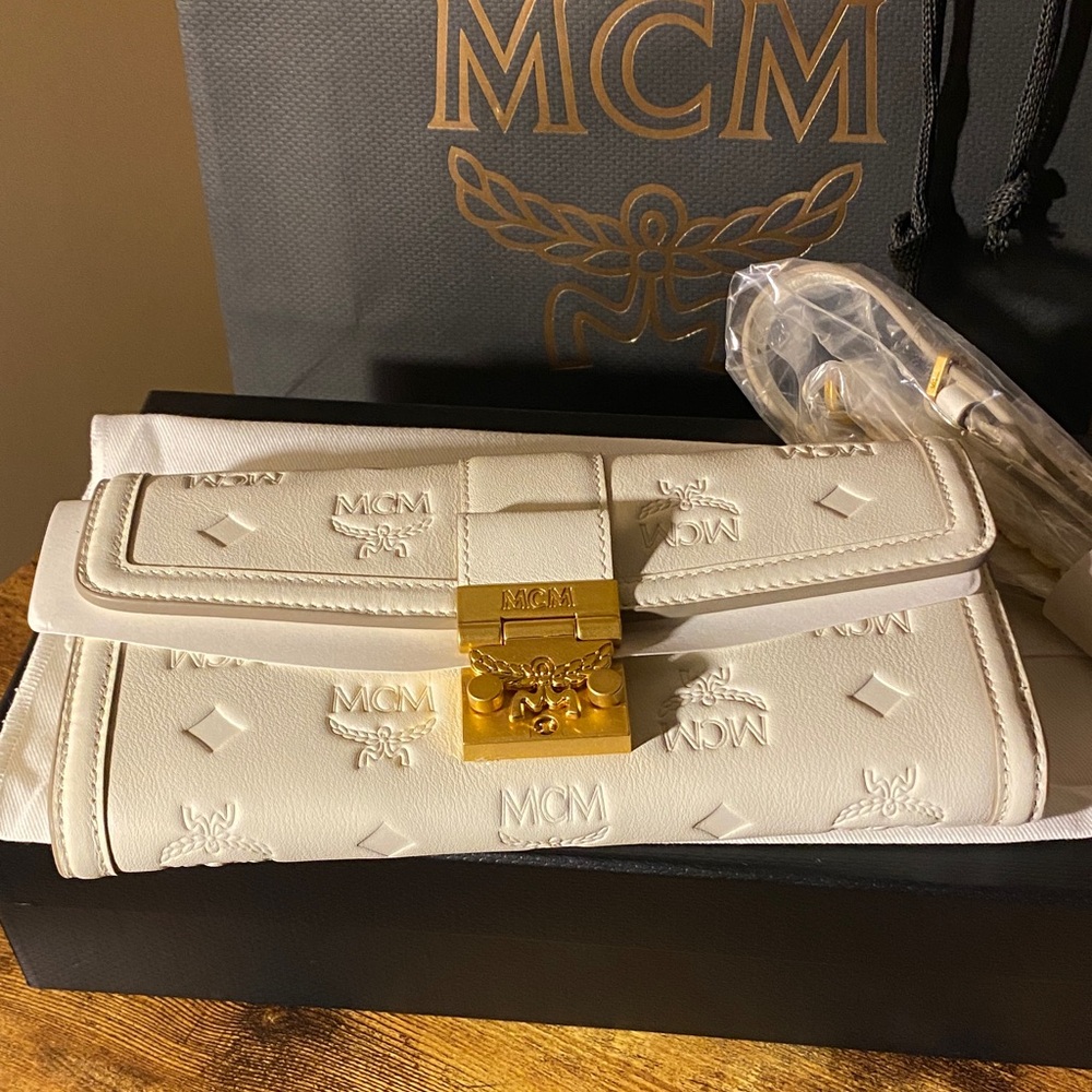 New MCM Egret Leather Clutch